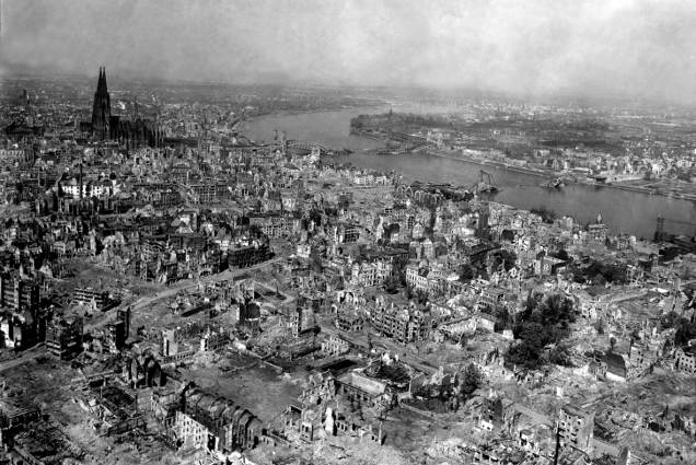 Cologne Cathedral stands undamaged while entire area surrounding it is completely devastated. Railroad station and Hohenzollern Bridge lie damaged to the north and east of the cathedral. Germany, April 24, 1945. T4c. Jack Clemmer. (Army) NARA FILE #: 111-SC-206174 WAR & CONFLICT BOOK #: 1337